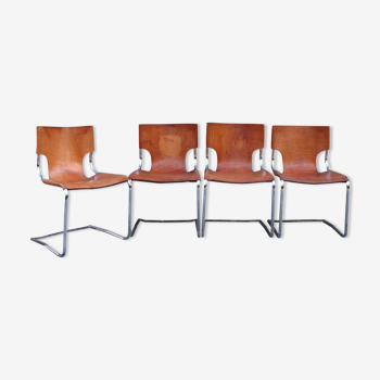 Suite de 4 chaises modèle 920 en chrome et cuir par Carlo Bartoli