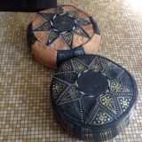 2 leather poufs