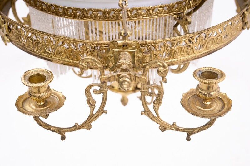 Brass chandelier from the first half of the 20th century.
