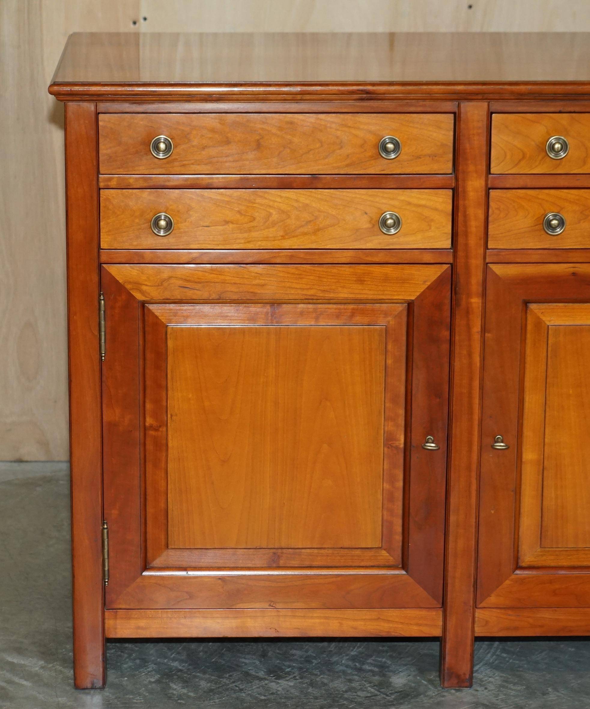 Large buffet Multiyork in solid cherry wood with six drawers.