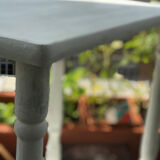 Vintage wooden side table with white patina