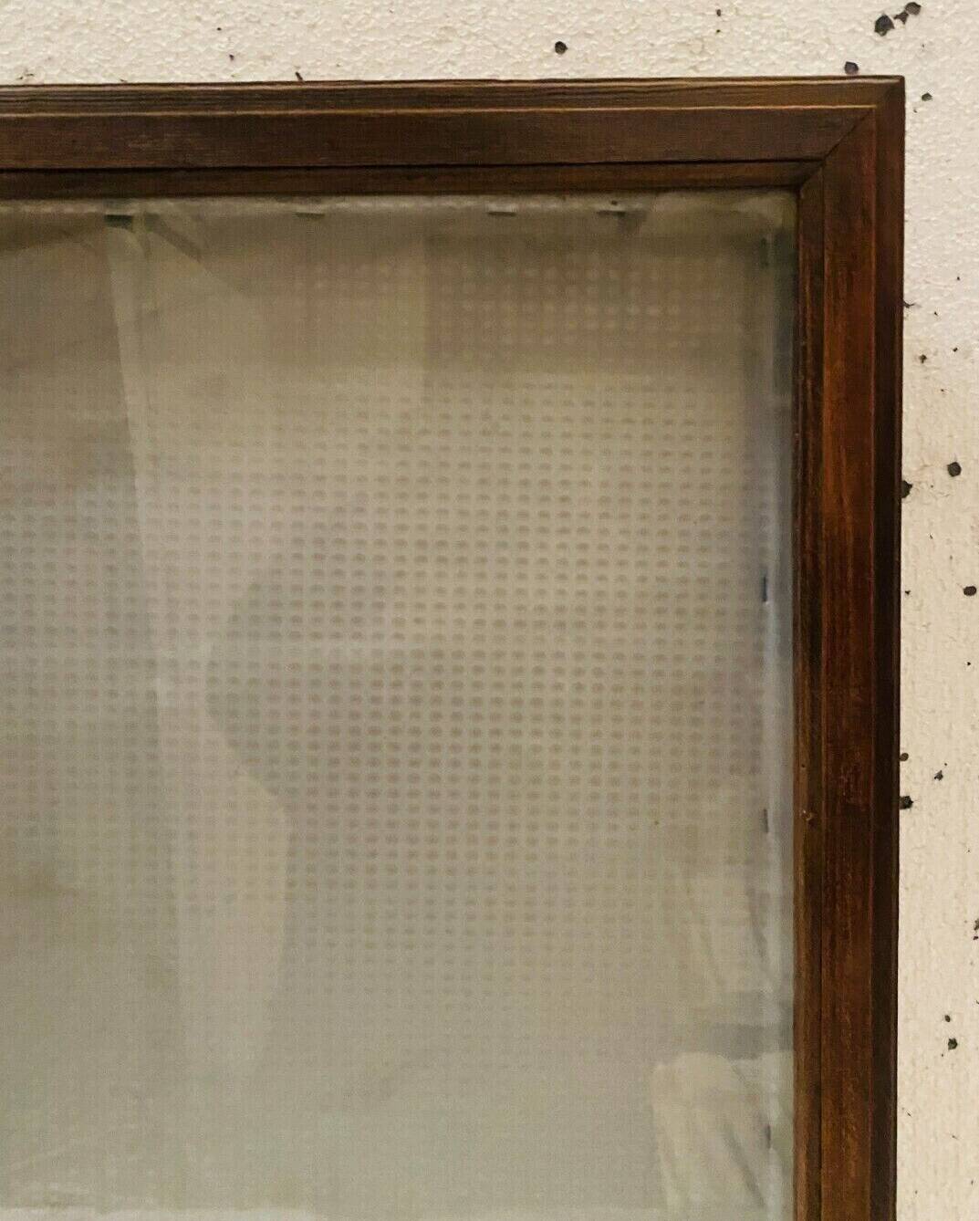 Wall display case with a solid oak door