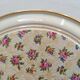 Vintage round trivet, ideal for adding a romantic touch.