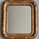 Miroir Louis-Philippe en bois et stuc doré à décor floral, XIXe, 43 x 38 cm