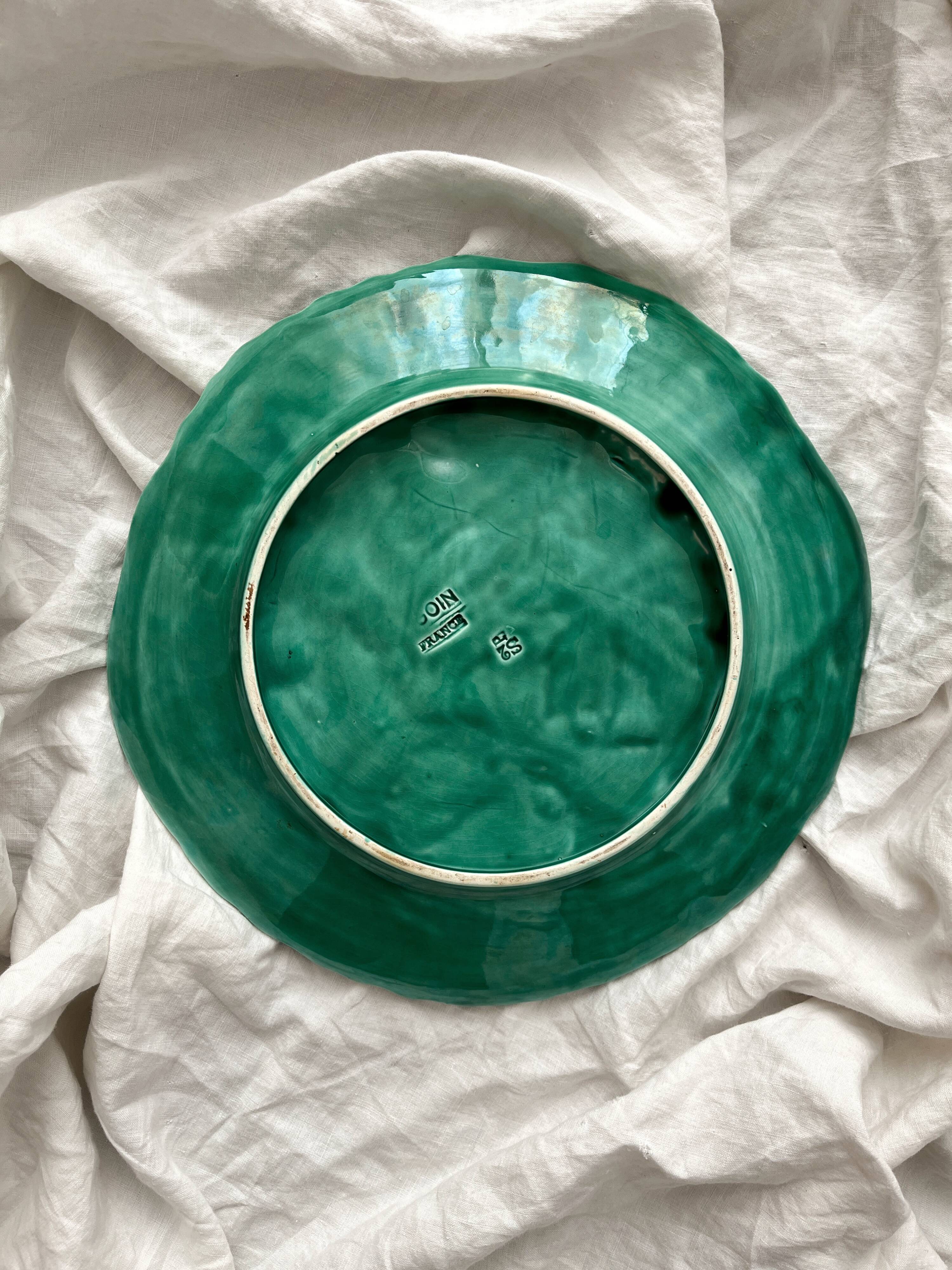 Round barbotine dish decorated with green leaves, Digoin vintage