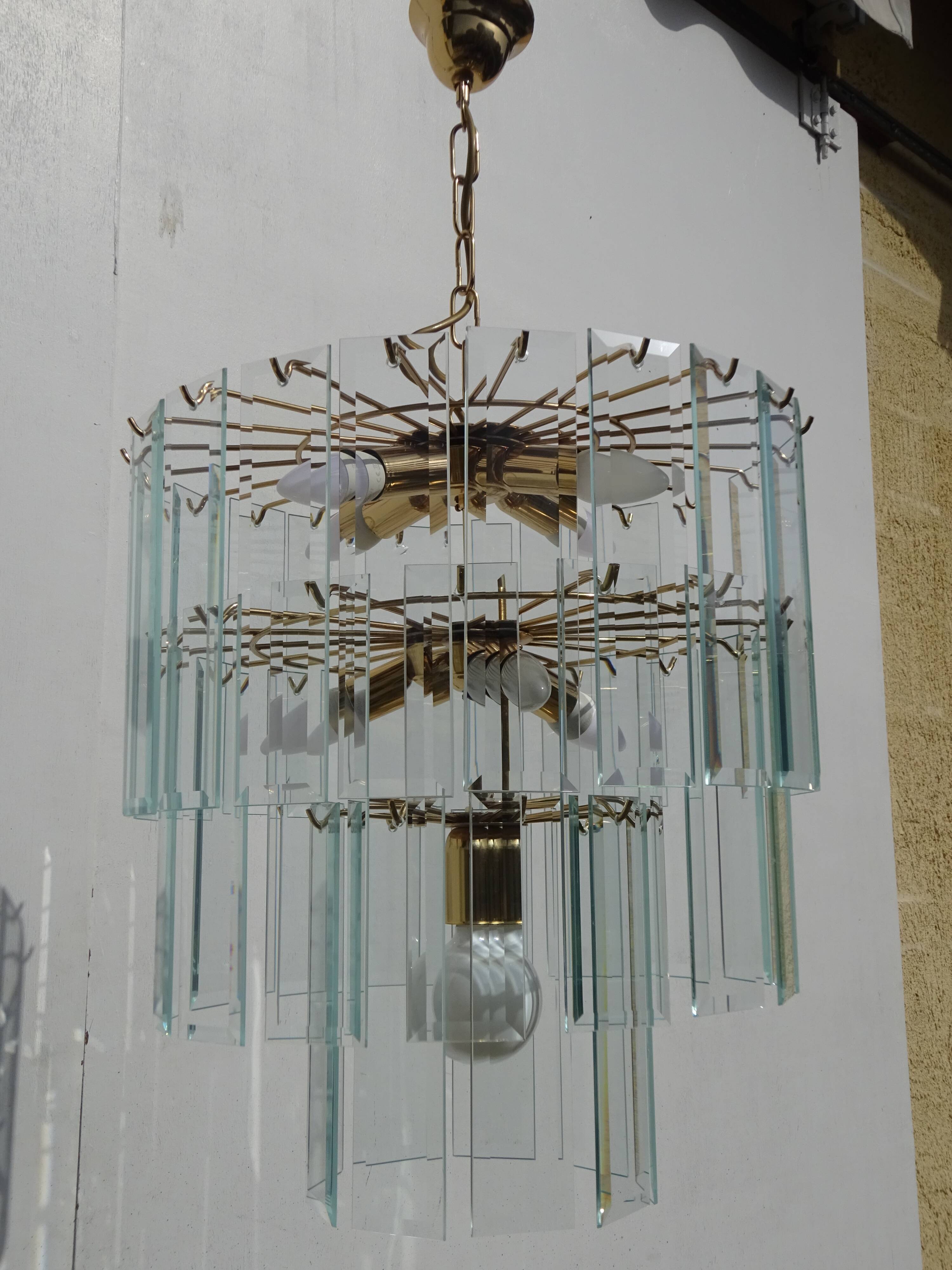 Brass chandelier and beveled glass, Italian manufacturing