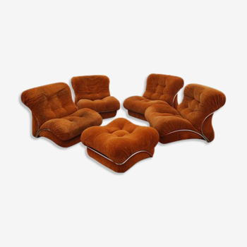 Set of 4 vintage armchairs and vintage ottoman