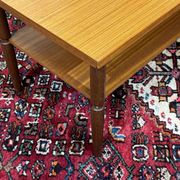 1970s English coffee table in teak and iroko.