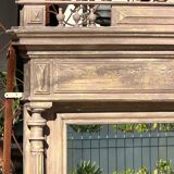 Imposing fireplace mirror in carved and painted wood, 19th century.