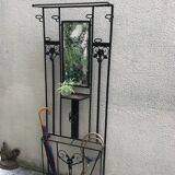 Wrought iron coat holder with 1930