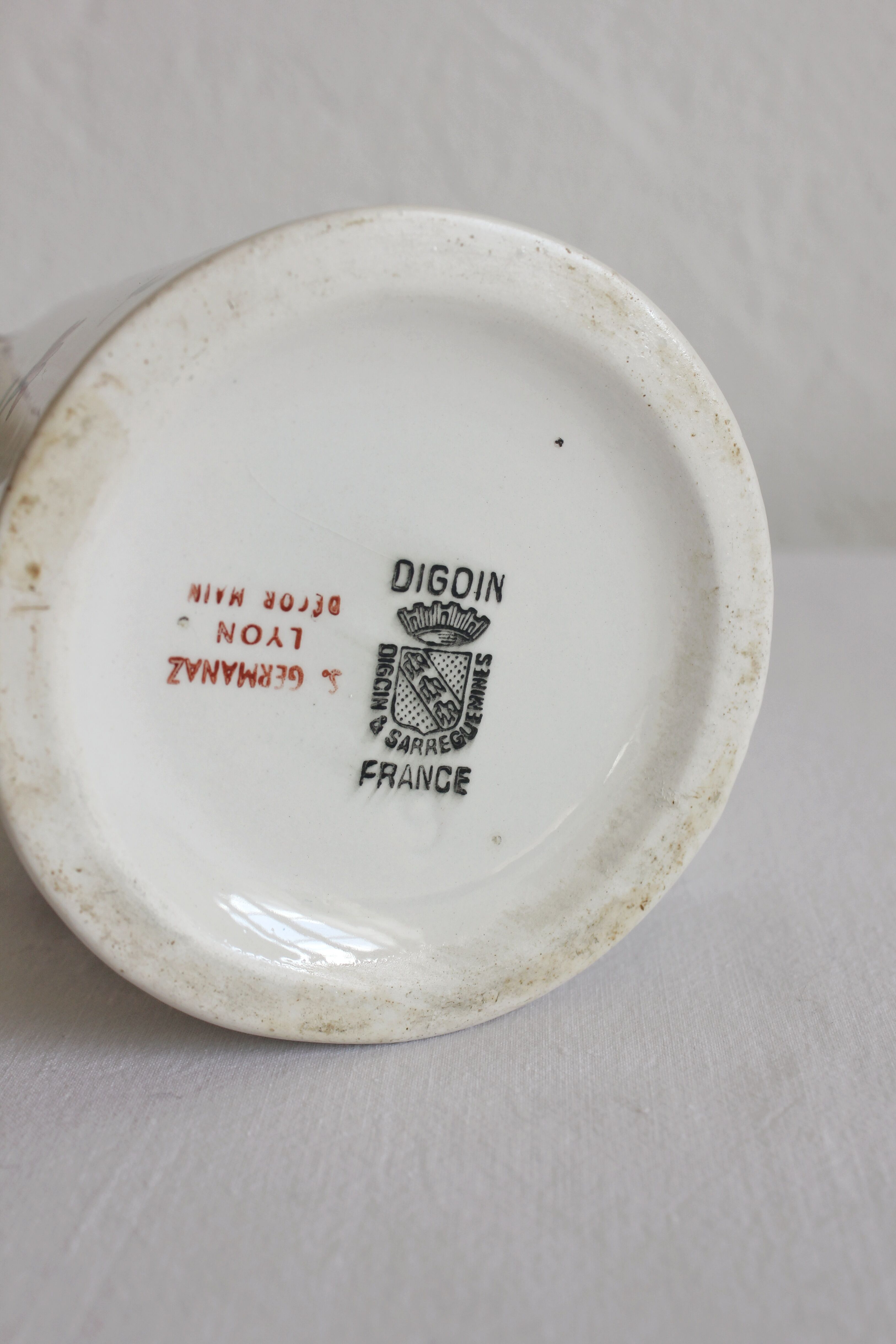 Earthenware jug with floral decoration from Digoin Sarreguemines.