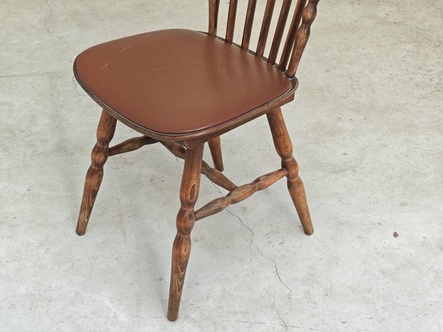Baumann Tacoma bistro chair, wood and brown faux leather, 1960.