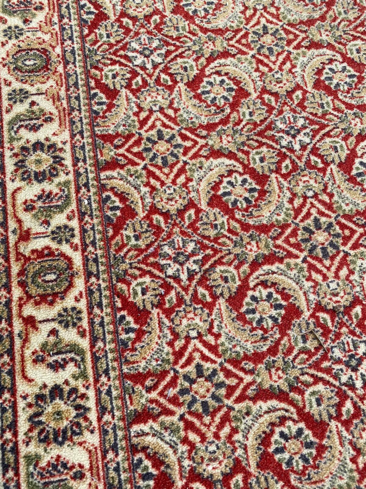 Long Persian rug in burgundy red wool with flowers, handmade 205x70