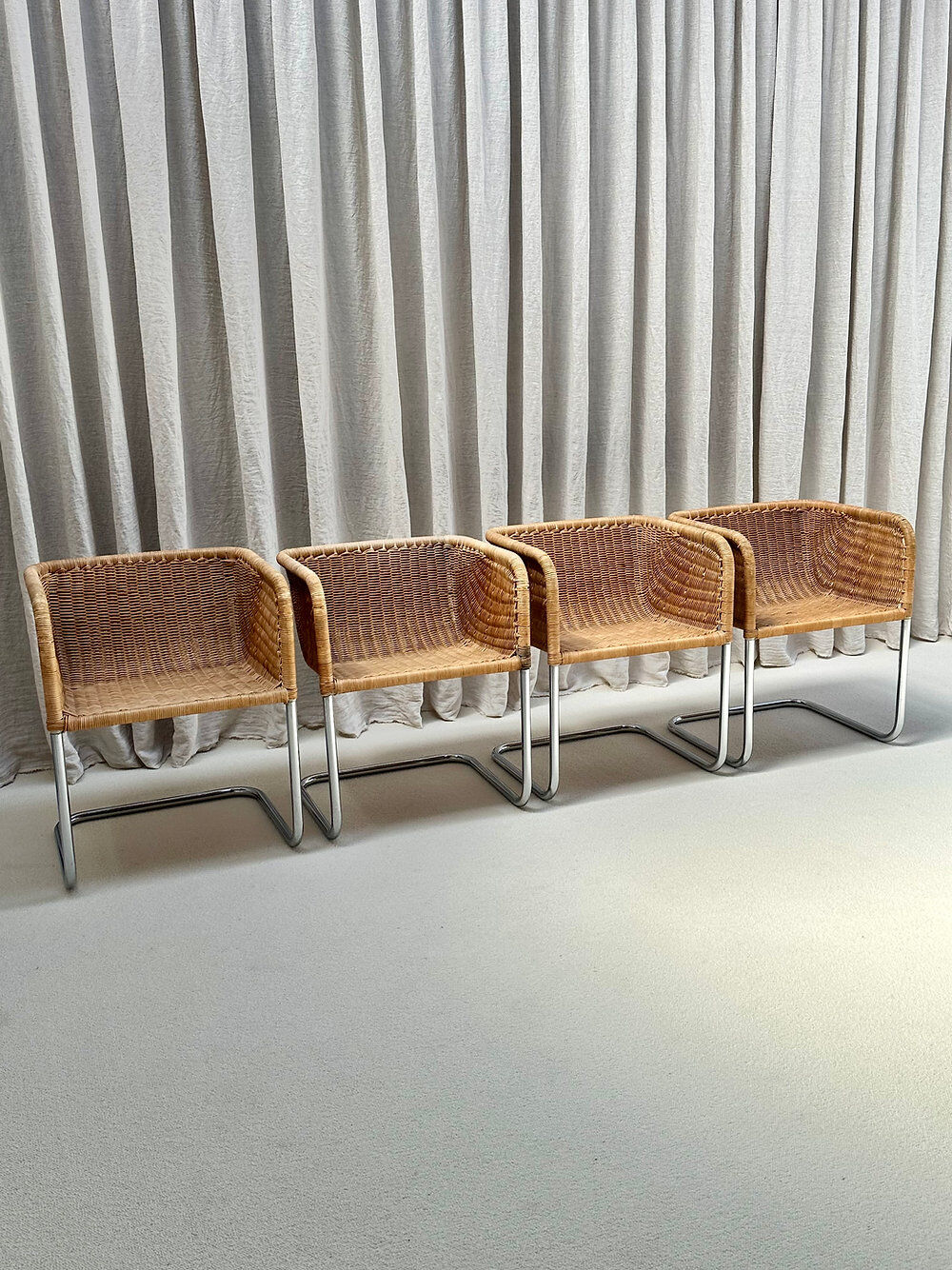 Set of 4 cantilever wicker chairs, attributed to Harvey Probber, USA, 1970s.