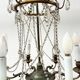 Louis XVI style chandelier with a pearl garland and painted tin, 20th century.