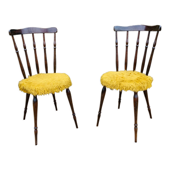 Pair of yellow moumoute chairs