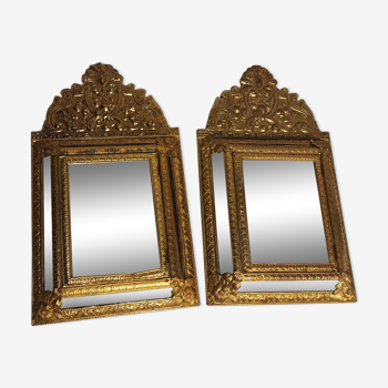Pair of mirrors with repelled brass parecloses 35x61cm