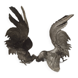 Pair of fighting cocks in silver metal