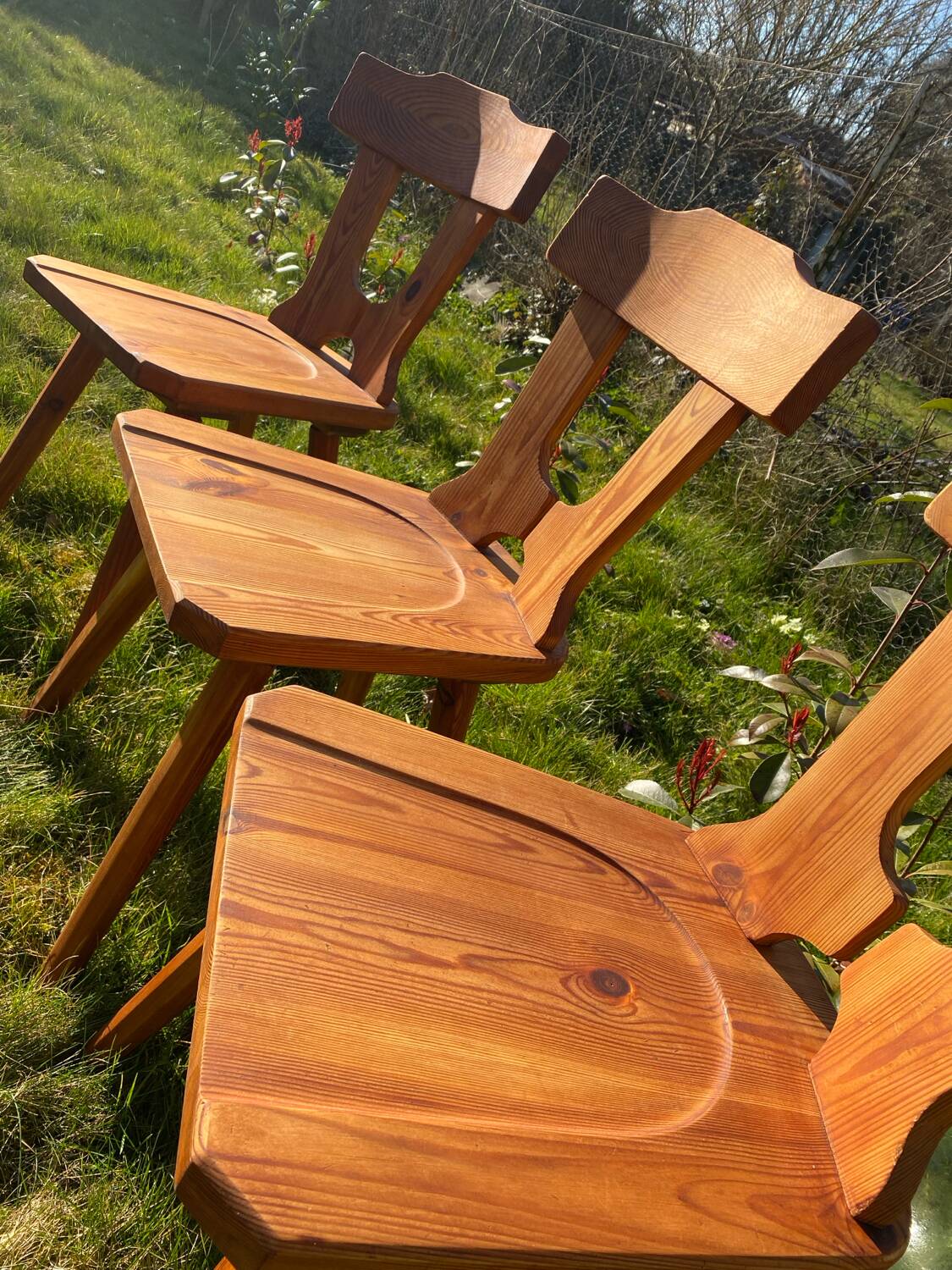 Three solid wood chairs