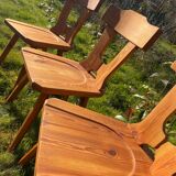Three solid wood chairs