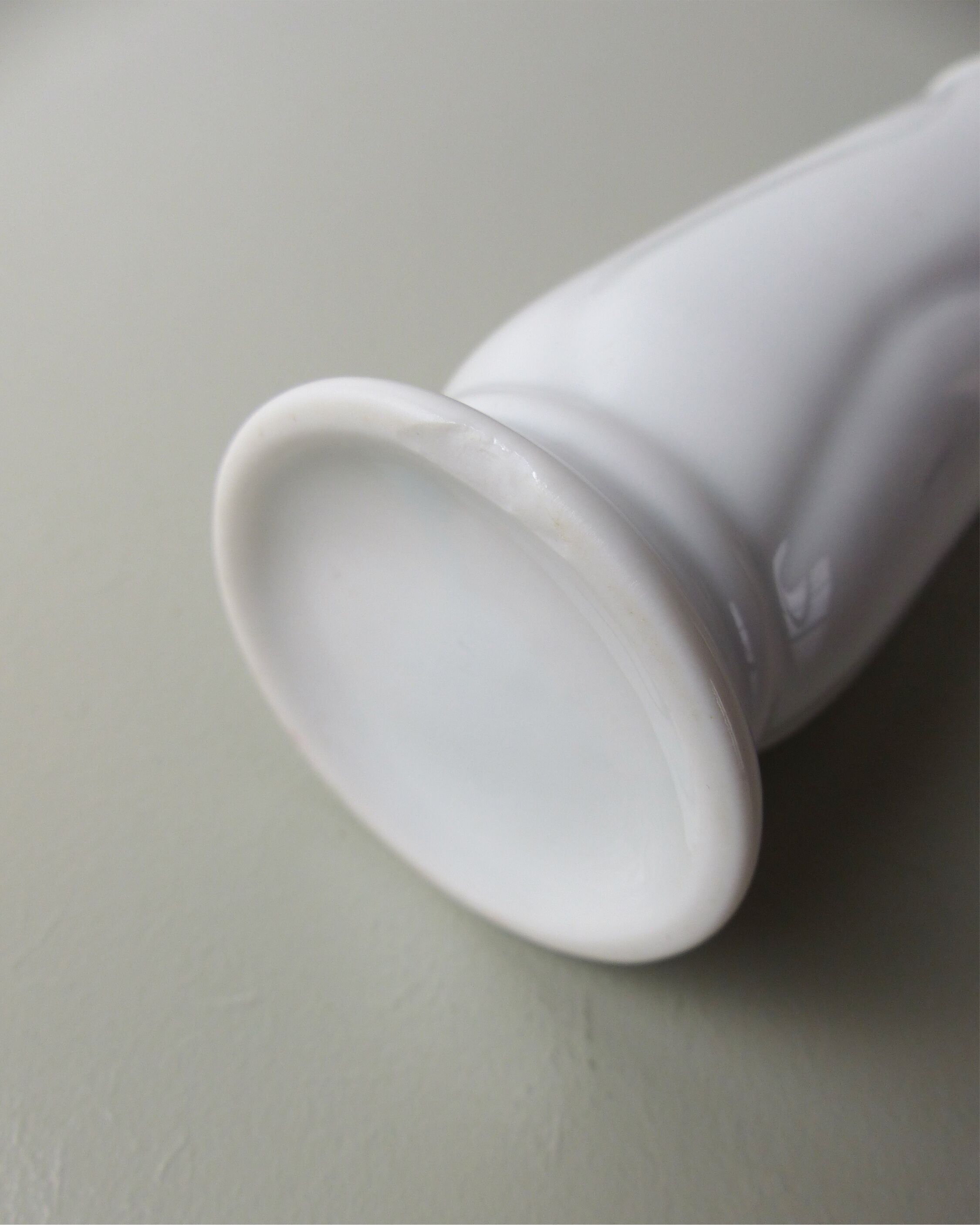 White porcelain tube vase