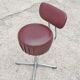 Set of 4 Mid Century Modern swivel chairs in tubular steel and leather.
