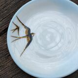 Cup and its saucer in Limoges porcelain motif "swallows"