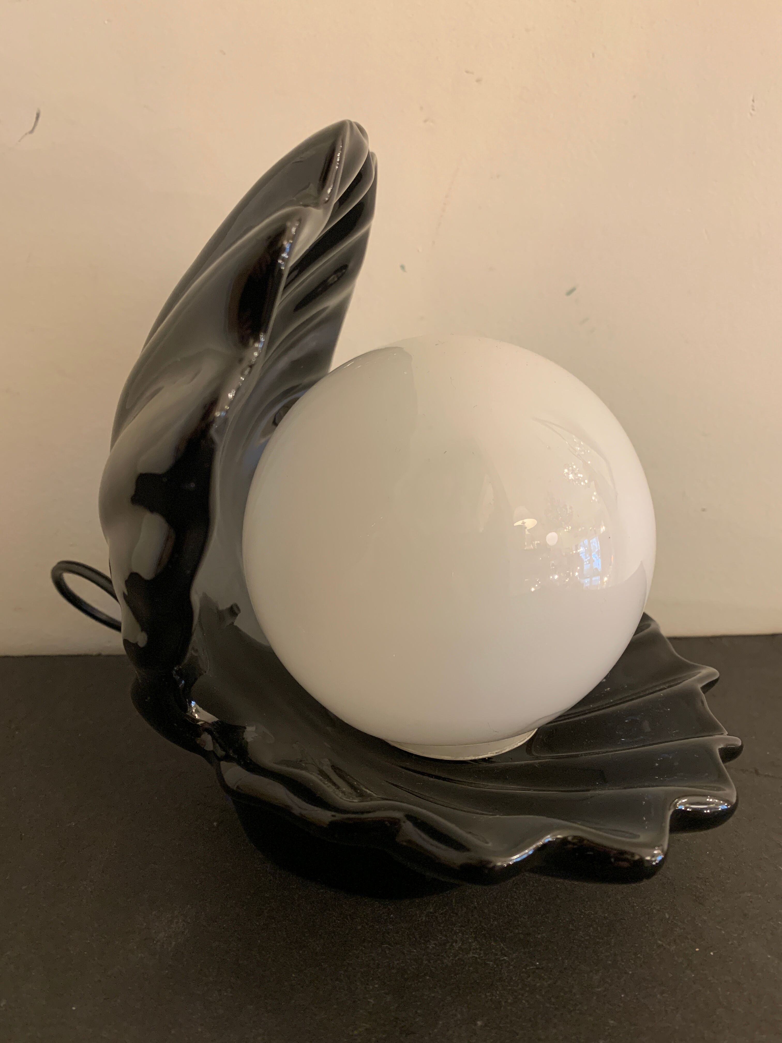 Black ceramic shell lamp and white opaline