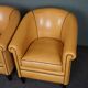 Set de 2 fauteuils club en cuir de mouton blond