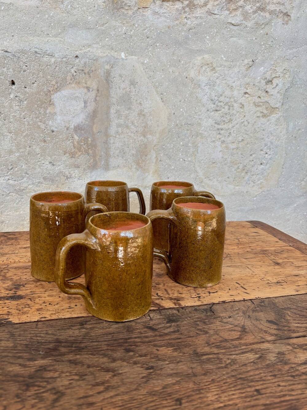 Set of 5 brown stoneware mugs