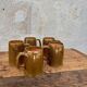 Set of 5 brown stoneware mugs