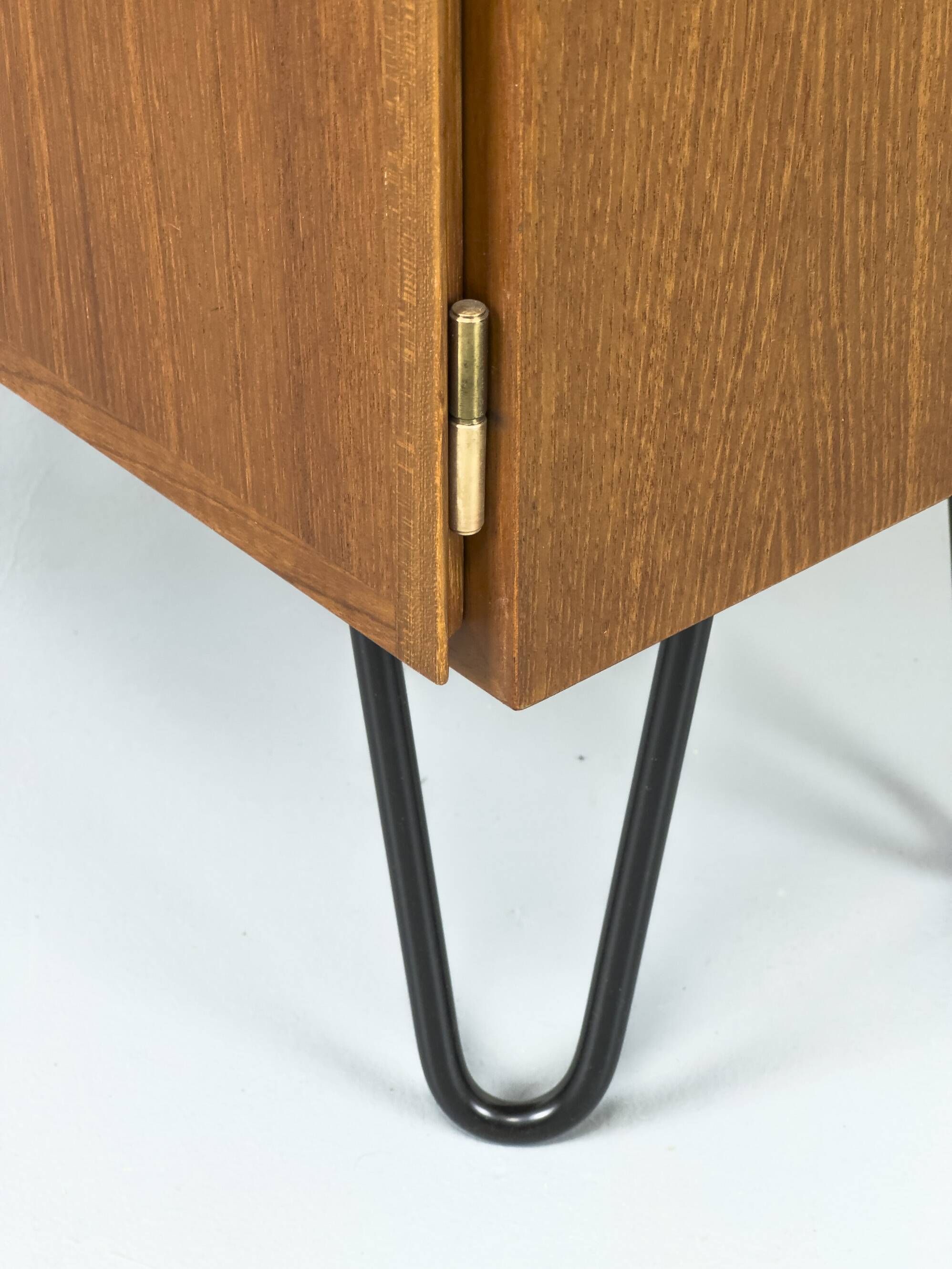 Narrow teak bookcase with two doors by Omann Jun, 1970s