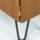 Narrow teak bookcase with two doors by Omann Jun, 1970s