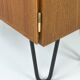 Narrow teak bookcase with two doors by Omann Jun, 1970s