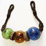 Fishing floats made of blown glass, cork, and rope. France, 1960s.