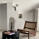 Reclined armchair in canned teak in natural wood