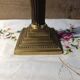 Golden brass candlestick, Corinthian style, vintage