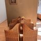4 chaises modernistes en rotin