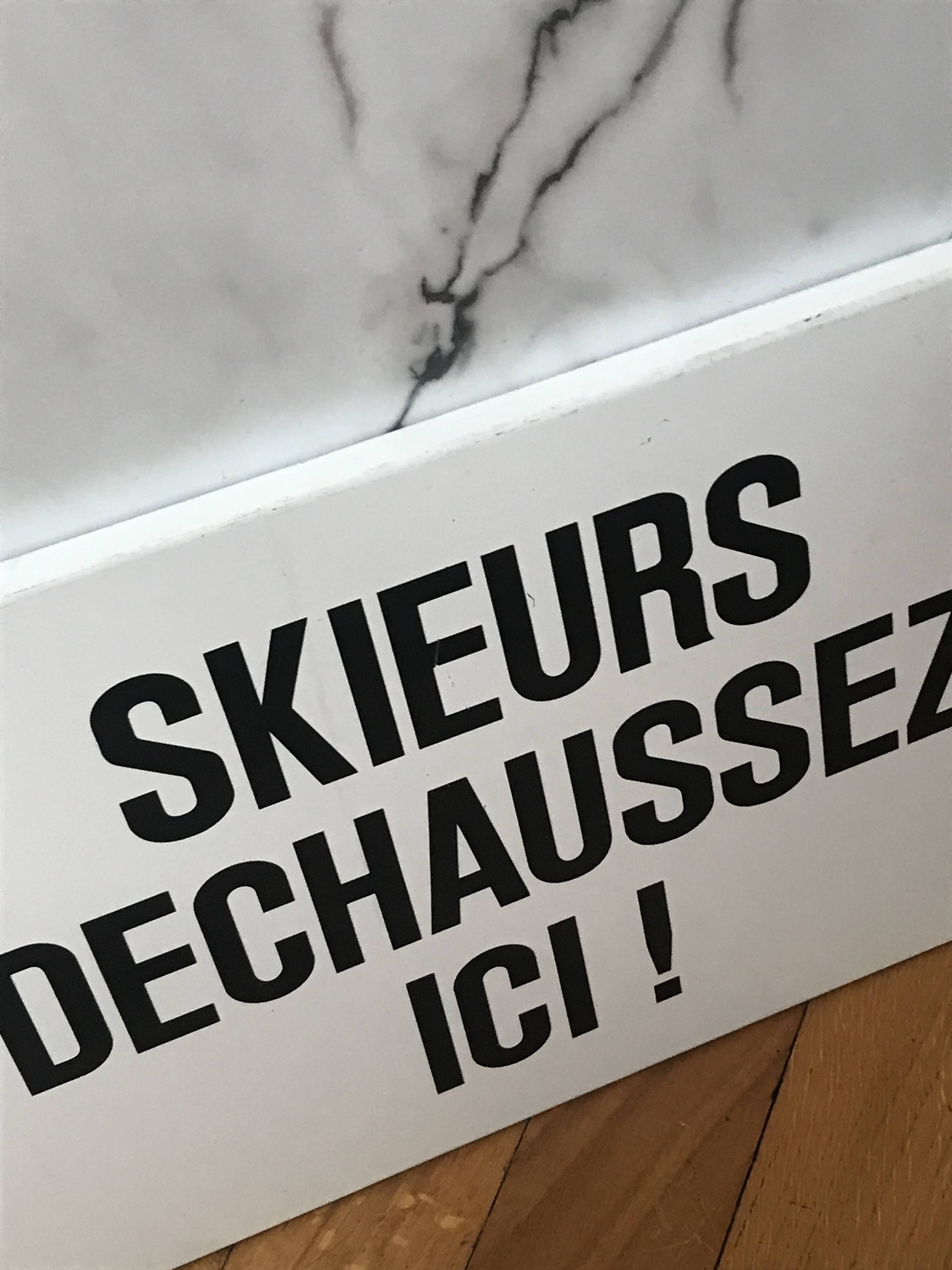Vintage metal plate ski signage