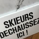 Vintage metal plate ski signage