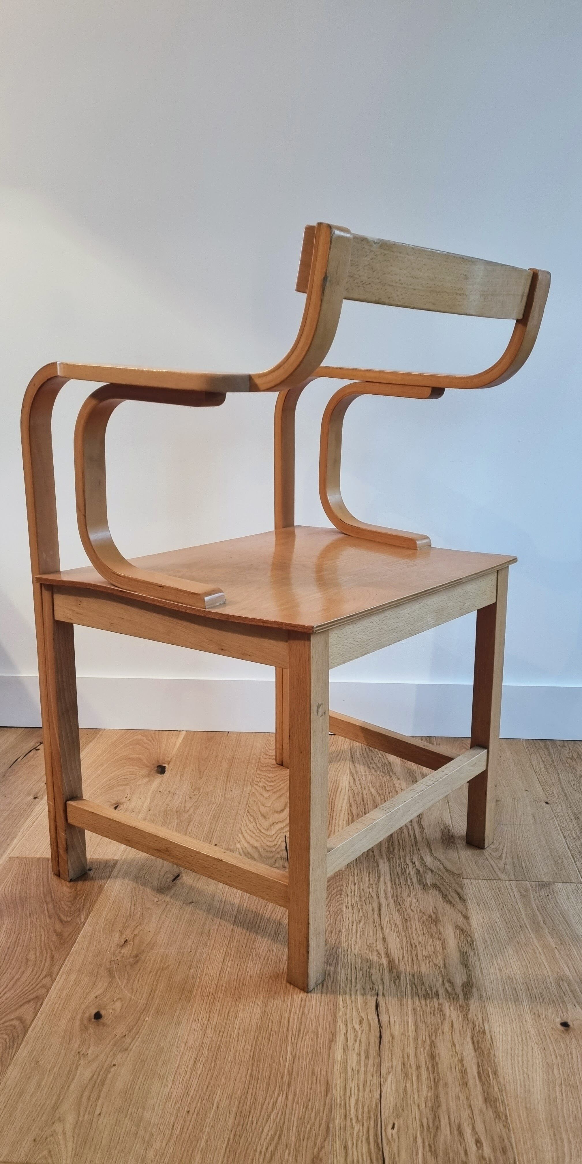 Vintage curved wood armchair