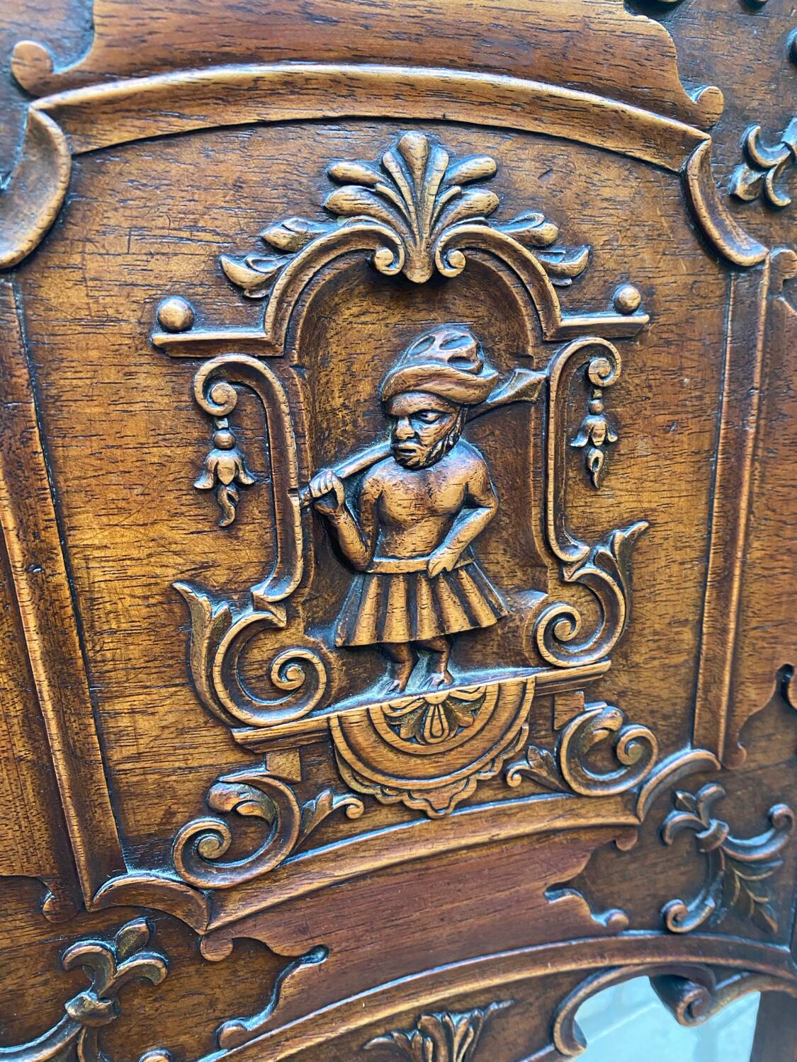 Carved walnut lounge chair