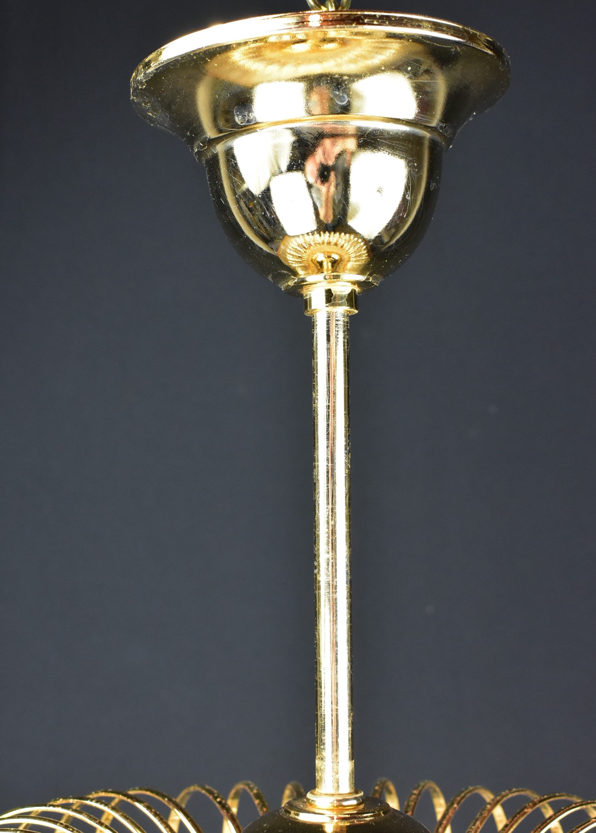 Suspension with tassels drops of water an glass