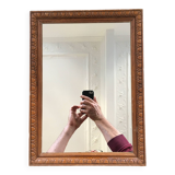 Old ornate wooden mirror
