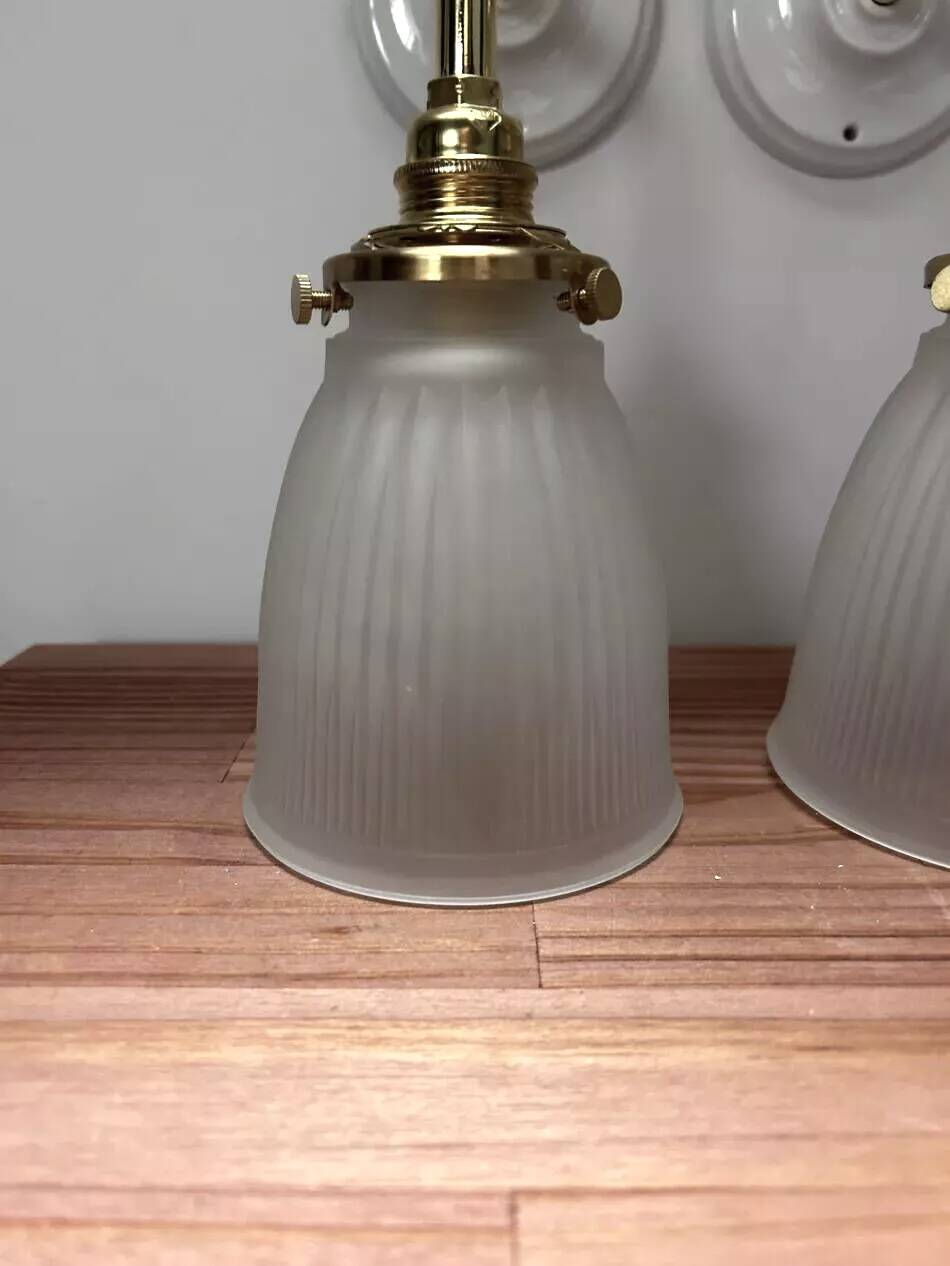 Pair of ribbed glass wall sconces