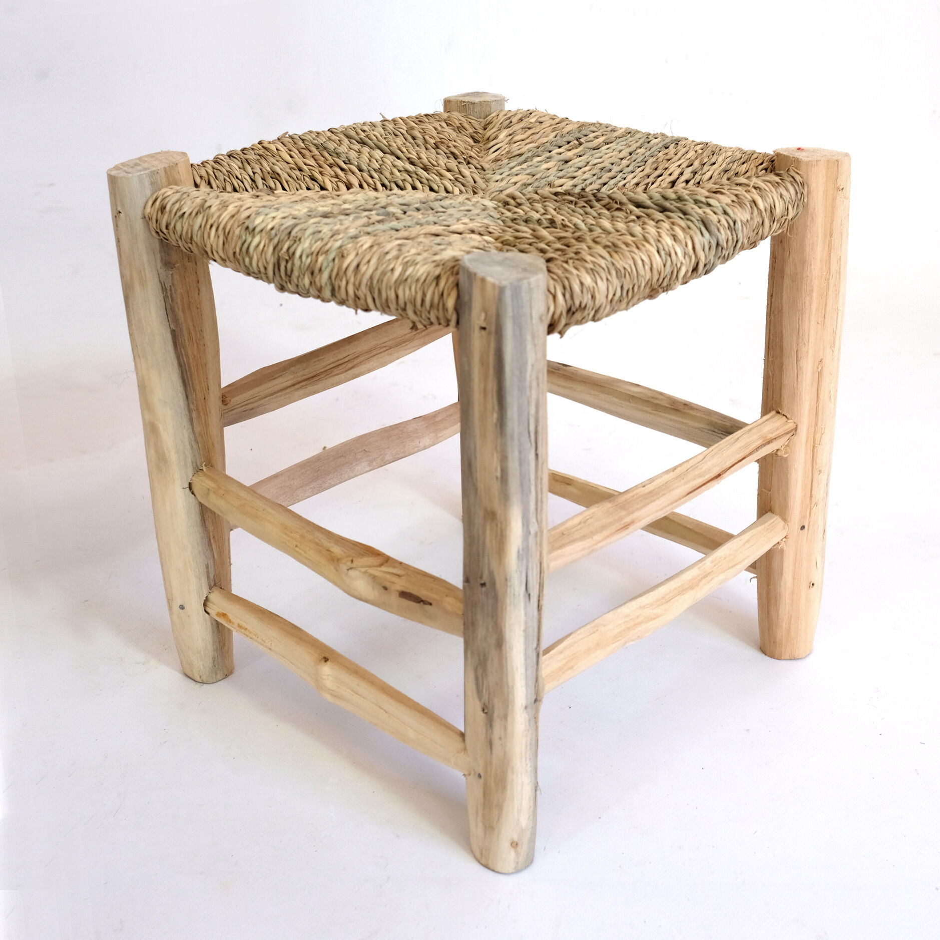 Minimalist stool made of wood and rope