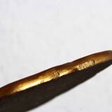 Golden mirror with decor