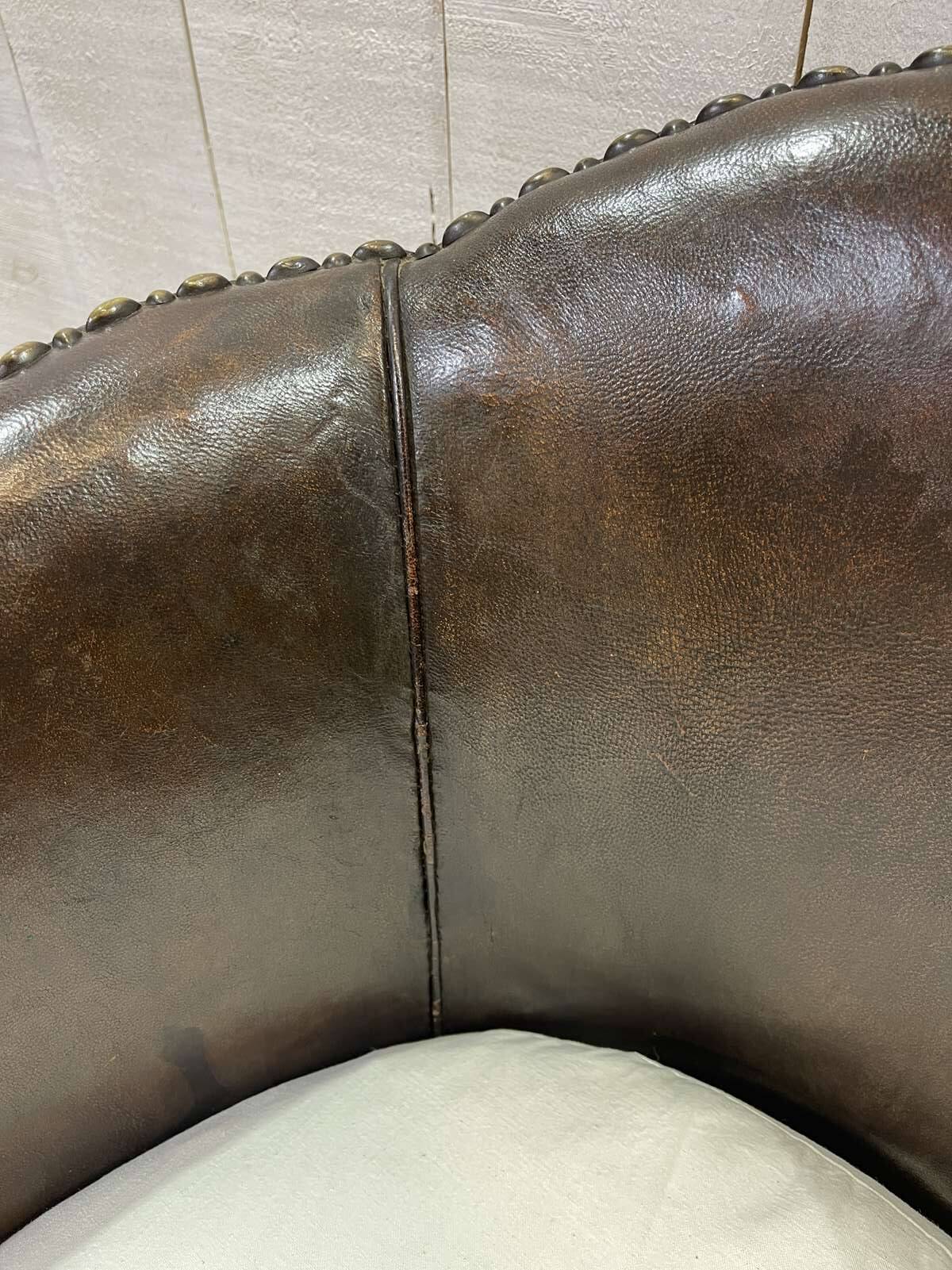 Art Deco period club lounge in leather and fabric seating