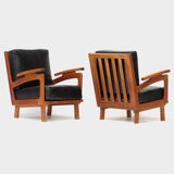Ensemble de deux fauteuils lounge vintage en cuir noir et structure en chêne, 1960-70