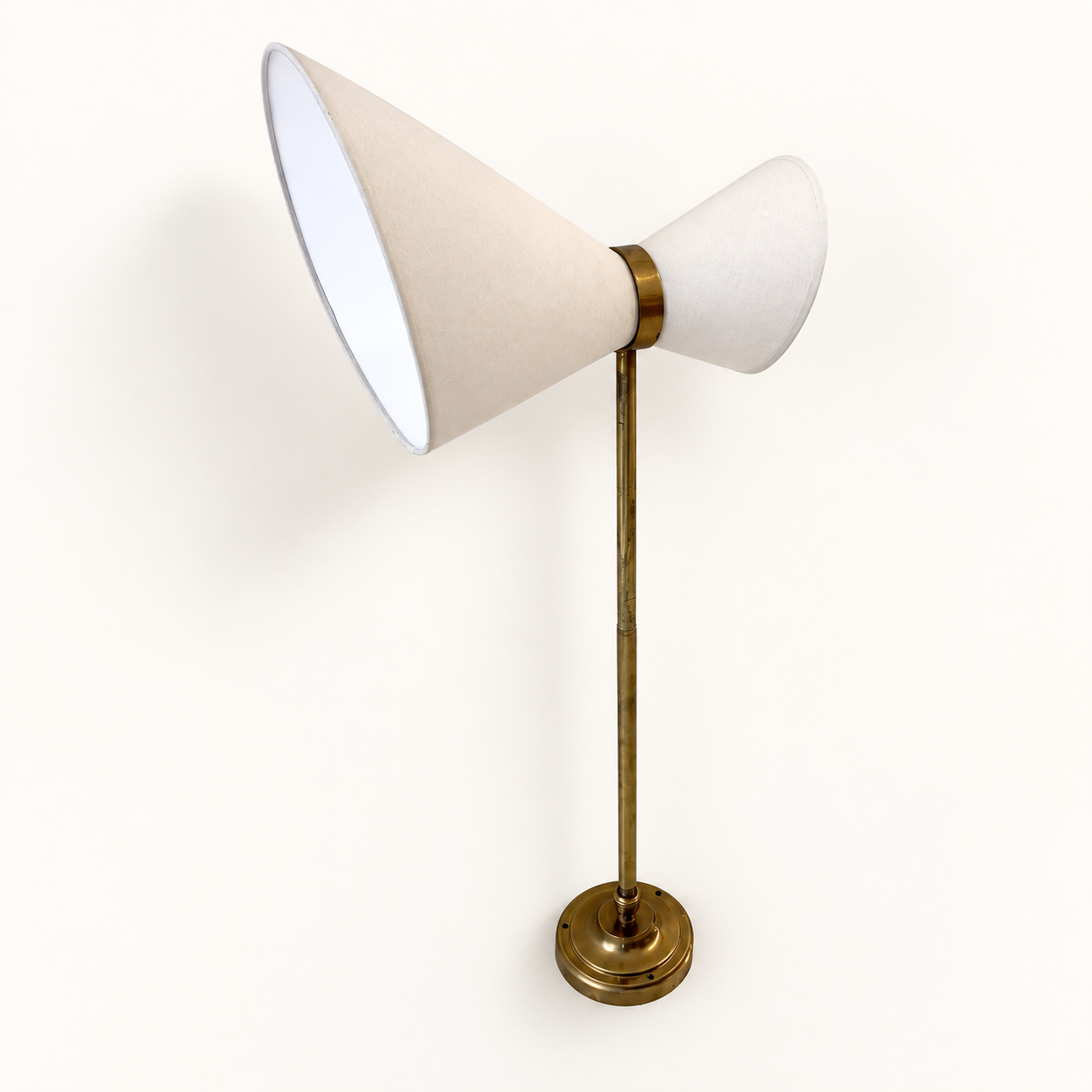 Extendable wall light in the style of Maison Lunel.